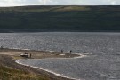 Windsurfers And Sailors On Shore Of Grimwith Reservoir